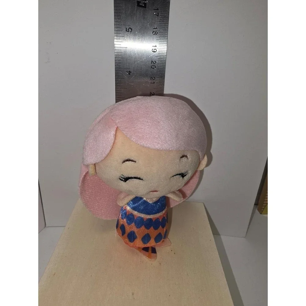 Disney Little Mermaid Caspia mini plush features a soft, light pink hairstyle